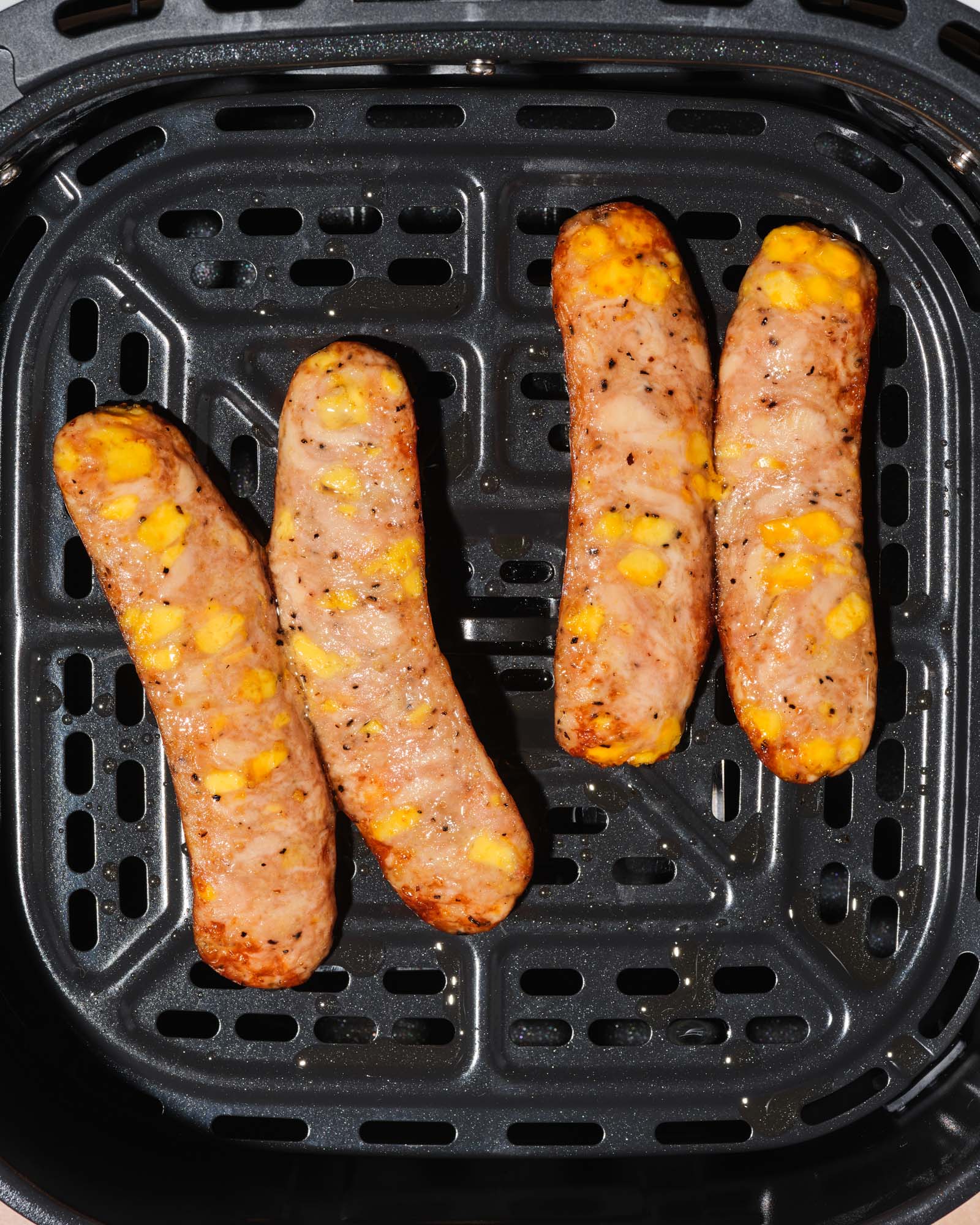 The Sausage Project's Melty Cheddar Chicken Sausage cooked in the air fryer