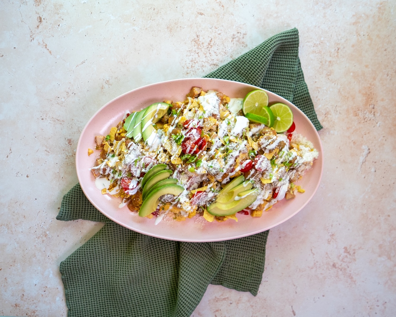 A colorful chilaquiles scramble with The. Sausage Project Melty Cheddar Sausage.