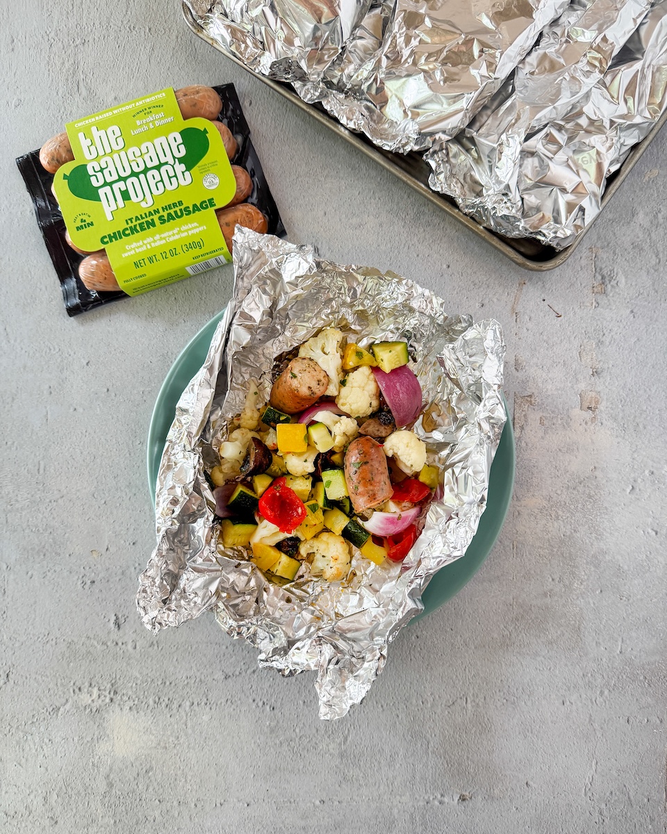 Italian Herb Chicken Sausage in a foil pack with tasty vegetables.