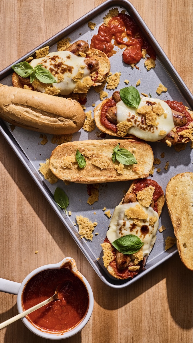 A tray of Italian Herb Chicken Sausage Parm sandwiches.