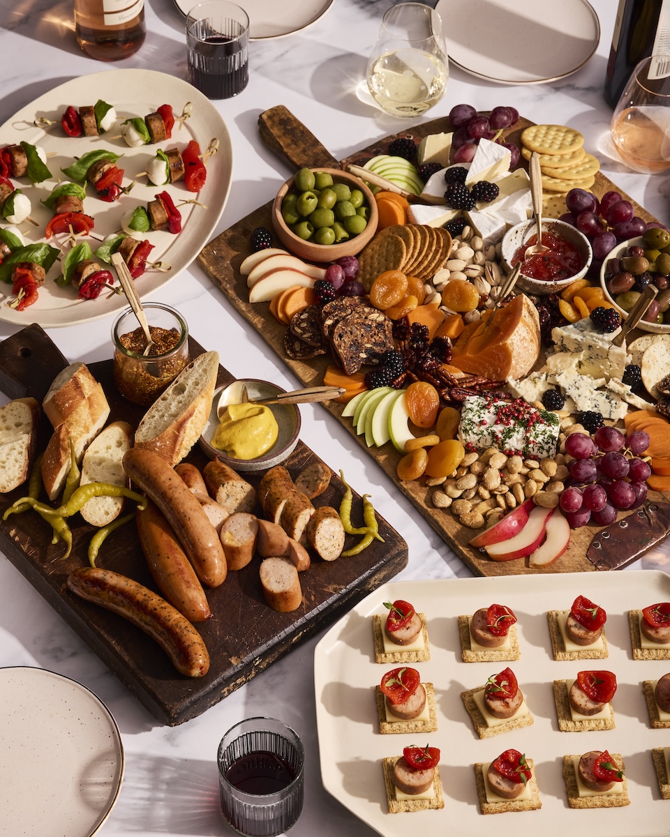 A huge holiday sausage and cheese spread.