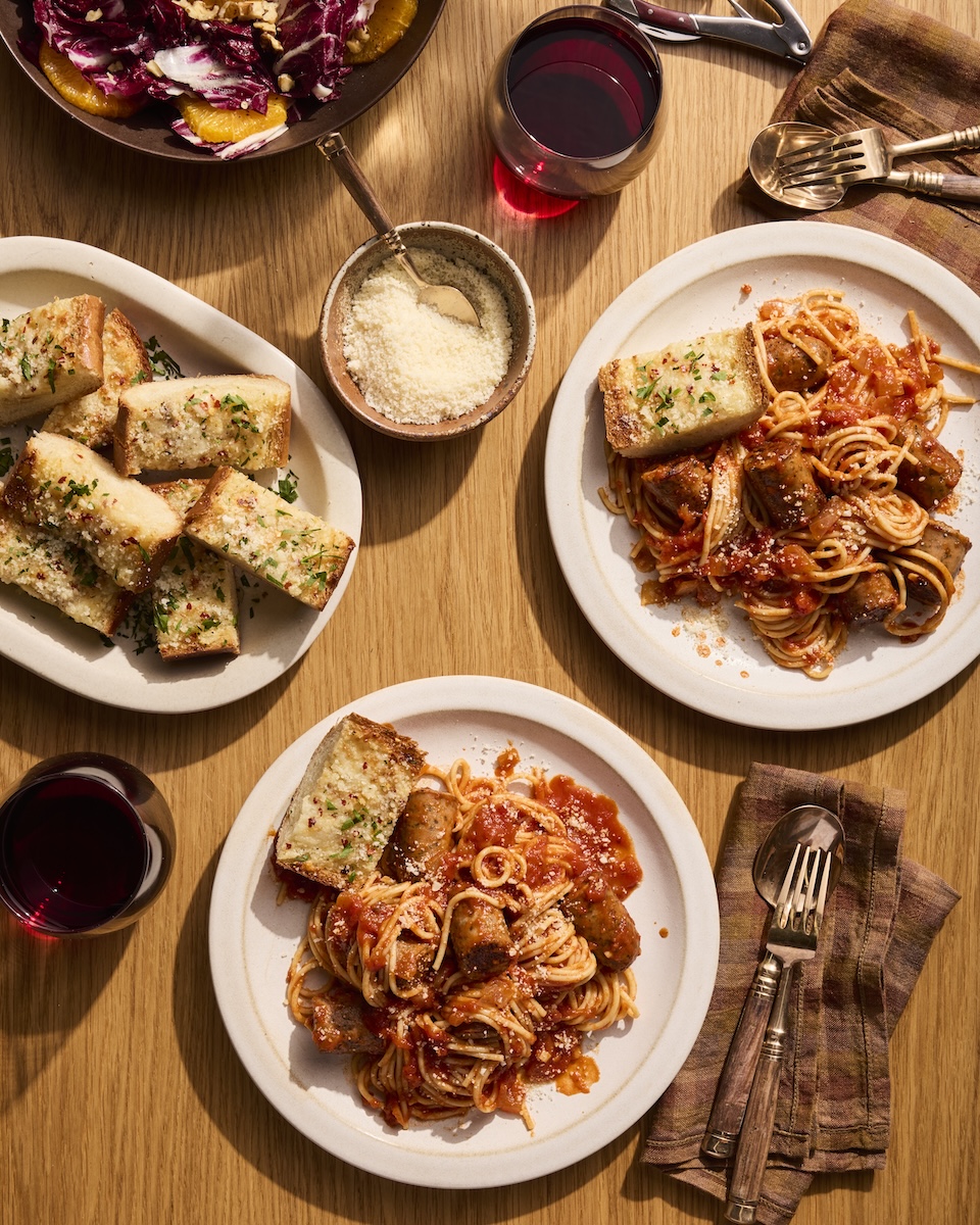 A big, family-style spaghetti and red sauce meal with Italian Herb Chicken Sausage.