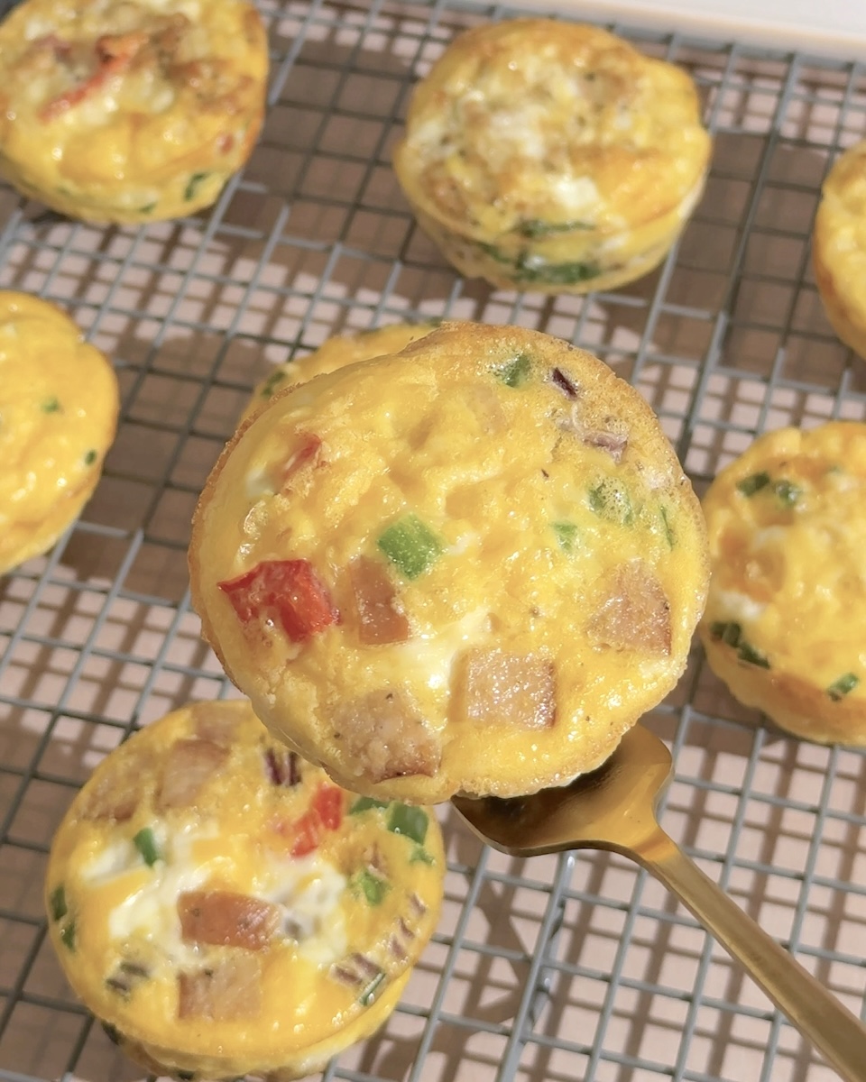 A close-up of a chicken sausage egg bite.