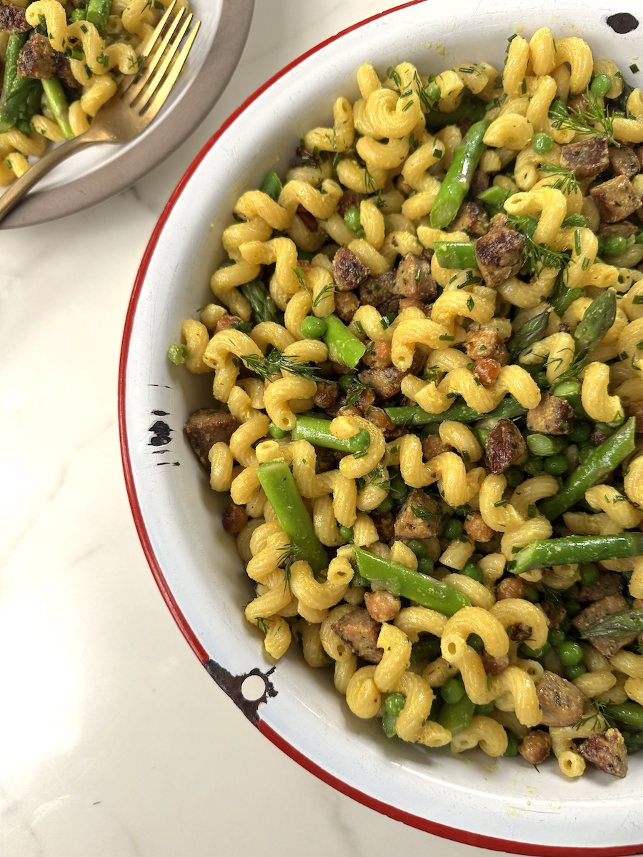 A vibrant pasta salad made with asparagus, peas, and Italian Herb Chicken Sausage.