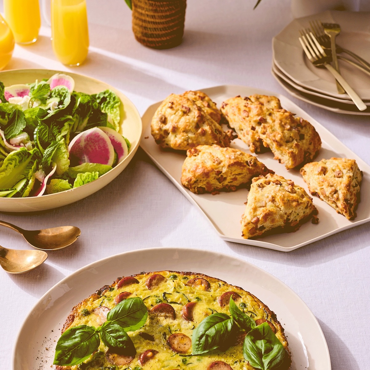 A delicious mother's day brunch being toasted with champagne.