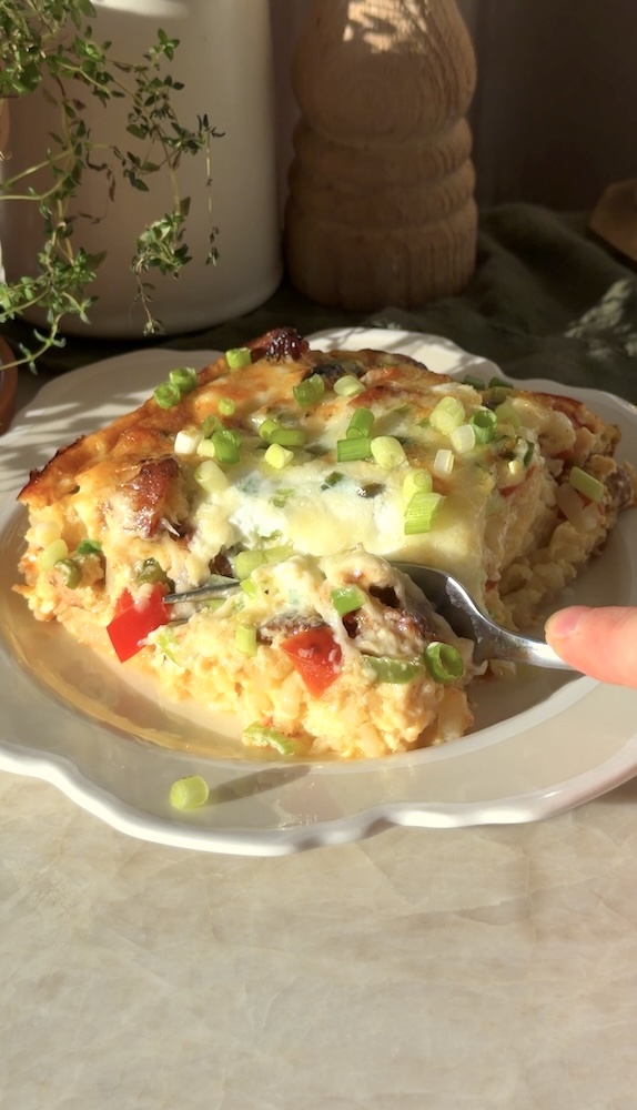 A slice of Cheesy Chicken Sausage Hash Brown Casserole.